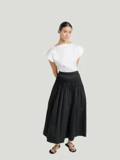 LAUDE the Label Drop Waist Pleated Skirt