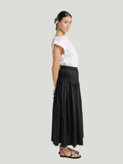 LAUDE the Label Drop Waist Pleated Skirt