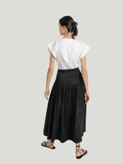 LAUDE the Label Drop Waist Pleated Skirt