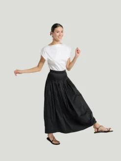 LAUDE the Label Drop Waist Pleated Skirt